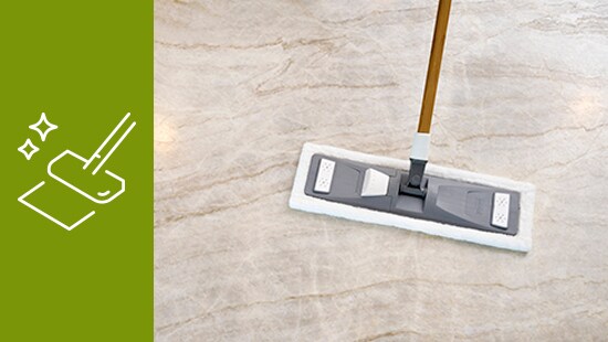 Mop cleaning a hard flooring surface