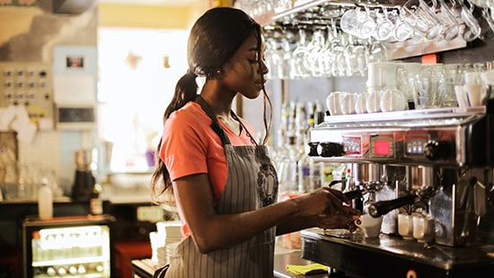 Female employee in coffee shop