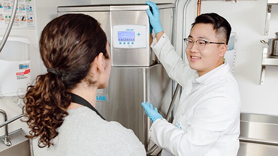 Ecolab technician presenting a dishmachine controler