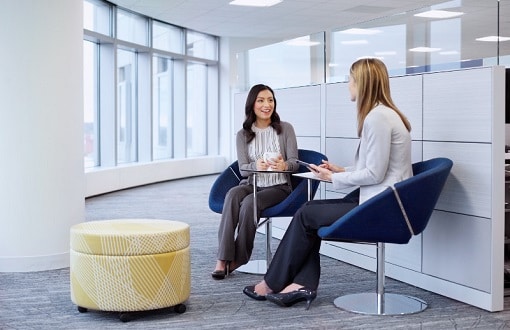 Two Ecolab employees meeting.