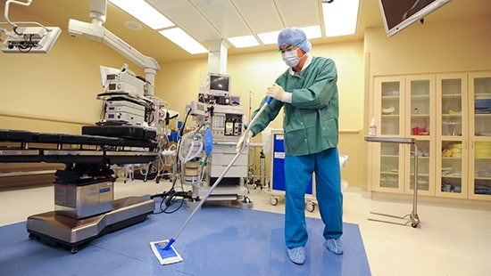 OR Staff cleaning the operating room