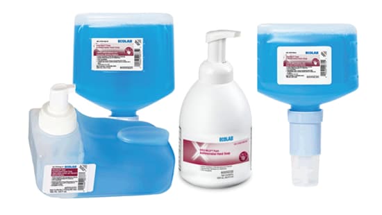 Assortment of Ecolab Equi-Mild hand soap refill bottles and a hand pump model.