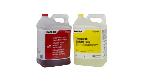 Two large industrial containers of Ecolab concentrated disinfectant detergent and concentrated sanitizing rinse