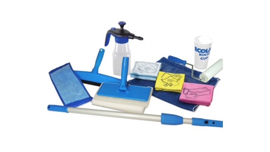 Complete collection of housekeeping tools by Ecolab with rolling brushes and spray bottle.