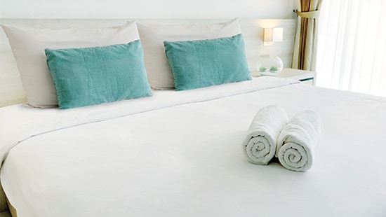 Freshly Made Bed with Two Towels FreshlyMadeBedw2towelsandlightgreenpillows