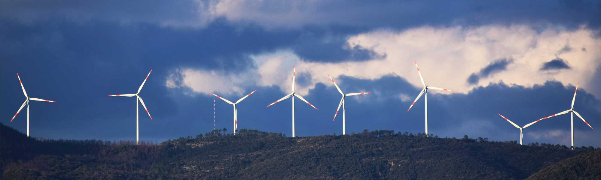 wind turbines on hill