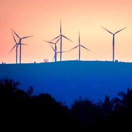 wind turbines at sunset