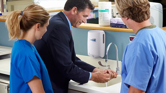 man washing his hands