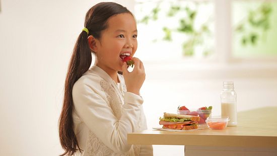GirlEatingStrawberry_Images_RawPhotograph.jpg