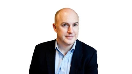 A headshot of Ben Clark
