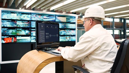 Man viewing ecoplant dashboard at computer