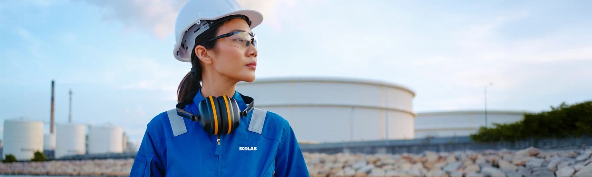 Engineer surveying an industrial site